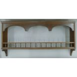 A Victorian hanging shelf. 112 cm wide.