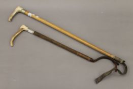Two vintage riding crops - one with silver collar. The largest 81 cm long.