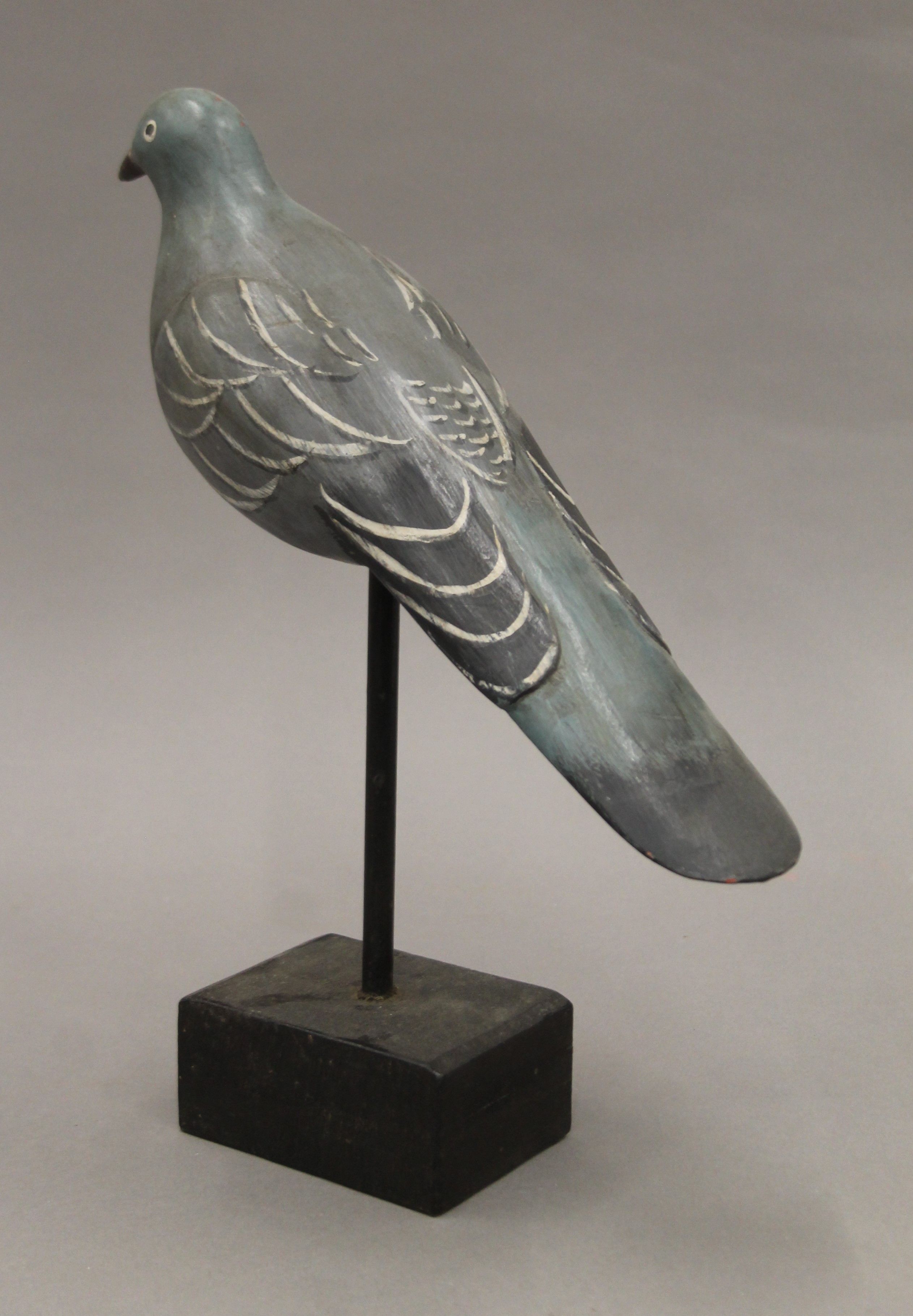 A vintage painted carved wooden pigeon decoy on stand. 35 cm long. - Image 4 of 4