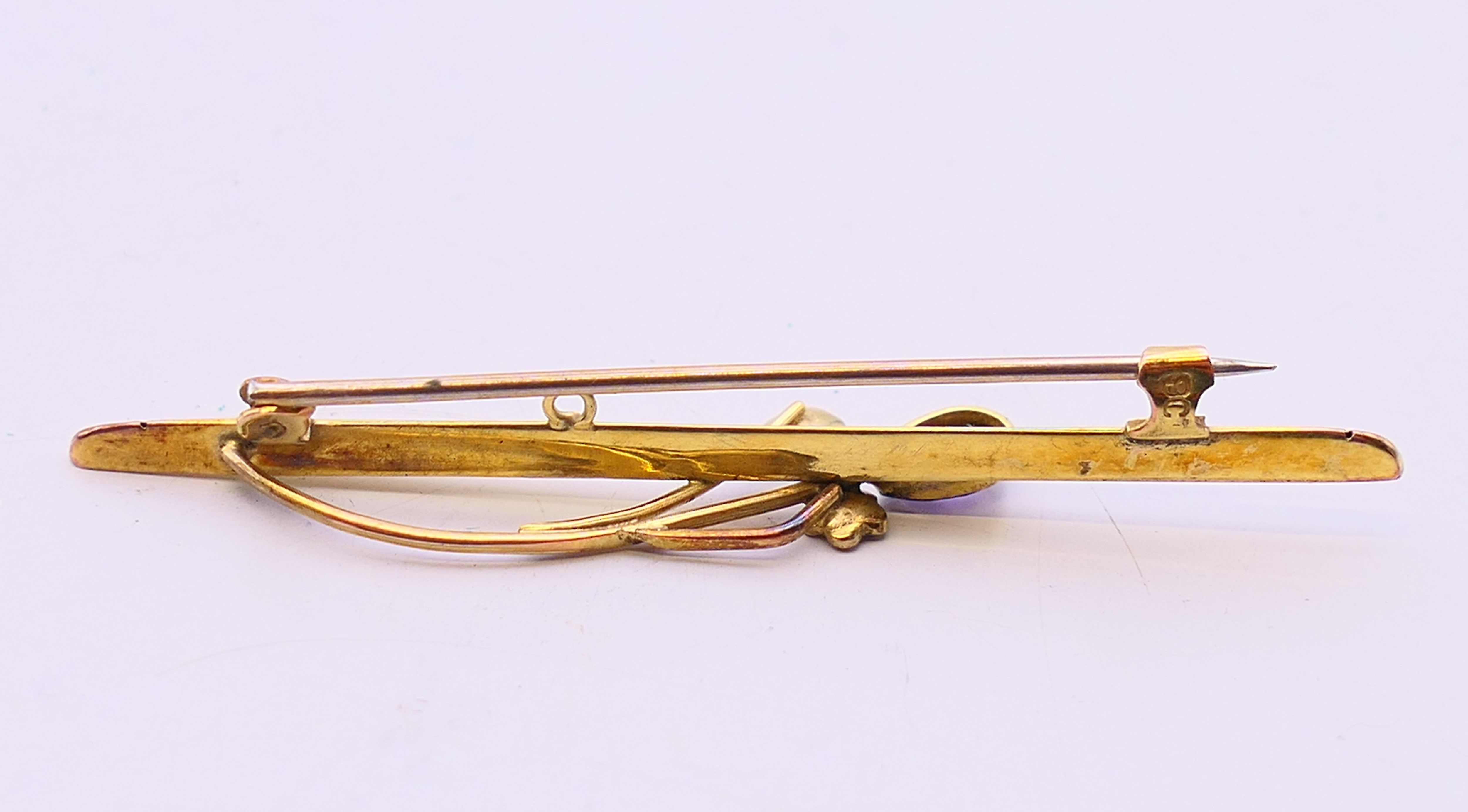 Three 9 ct gold brooches, one with pearls set within a 'D', all boxed. The largest 6 cm long. 5. - Image 13 of 14