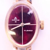 A Meister-Anker 835 silver ladies bracelet wristwatch with red dial. Bracelet 18.5 cm long.