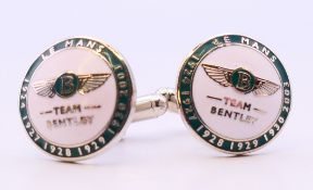 A pair of Bentley Le Mans cufflinks in a Hackett of London box. 1.75 cm diameter.