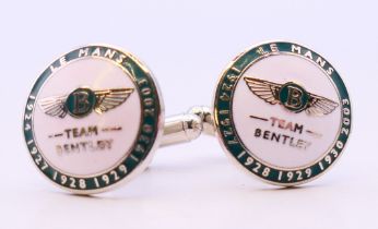 A pair of Bentley Le Mans cufflinks in a Hackett of London box. 1.75 cm diameter.