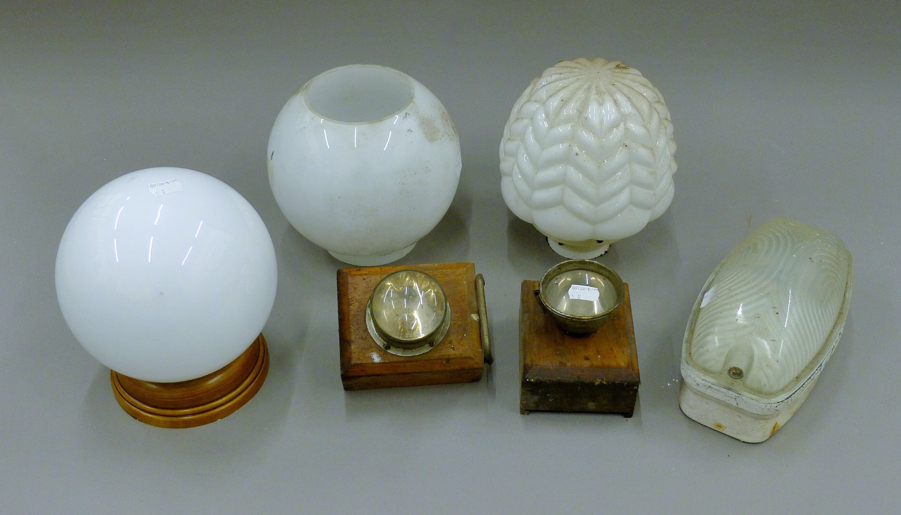 A quantity of various vintage lamps and shades. The largest 21 cm high.