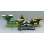 Three sets of vintage scales and weights. The largest 46 cm long.