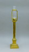 A Victorian Palmer and Co patent brass lamp. 64 cm high overall.