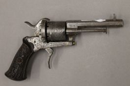 A 19th century pinfire pistol. 17.5 cm long.