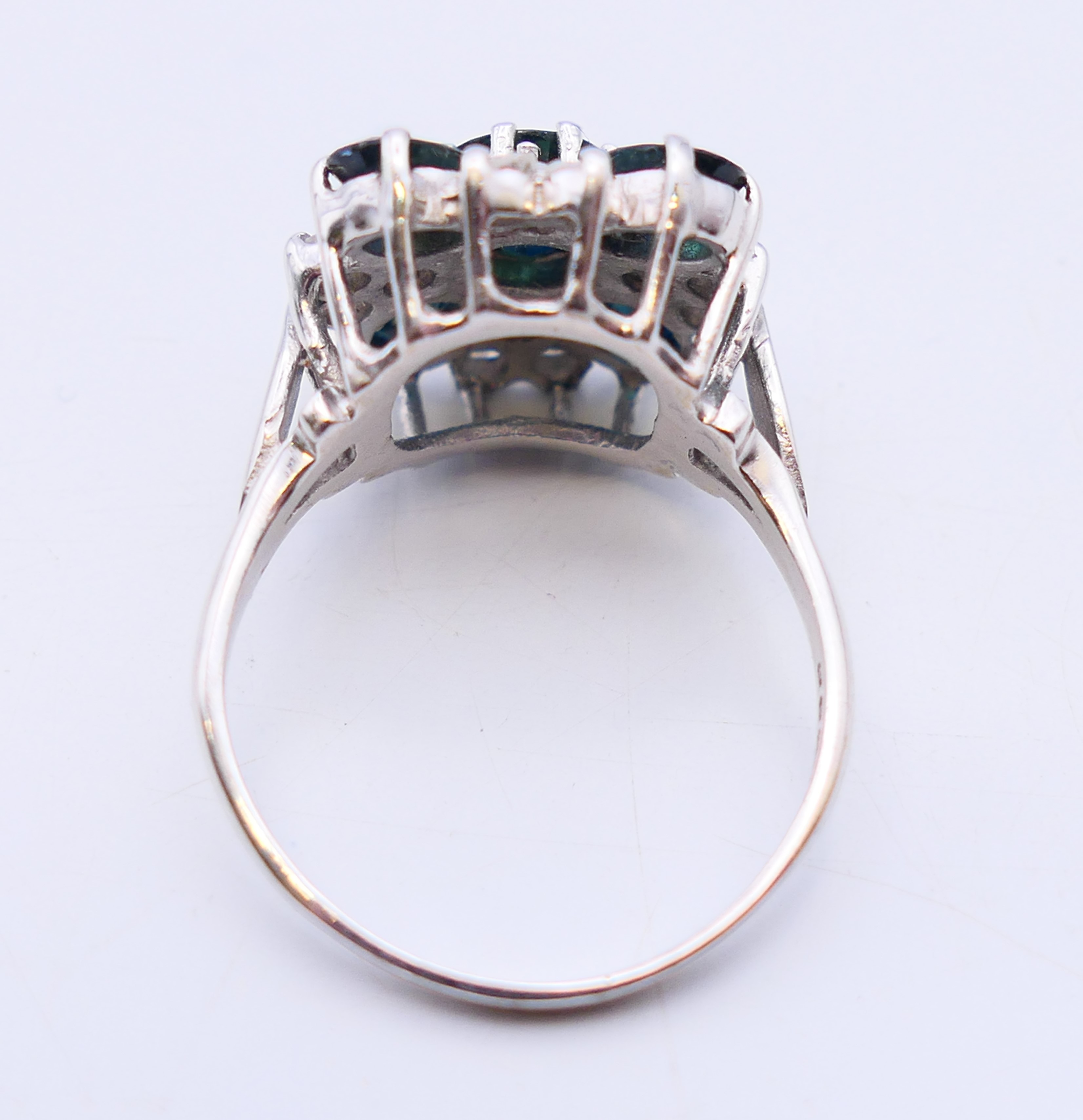 An 18 ct white gold, diamond and sapphire ring. 7 grammes total weight. Ring size Q. - Image 4 of 6