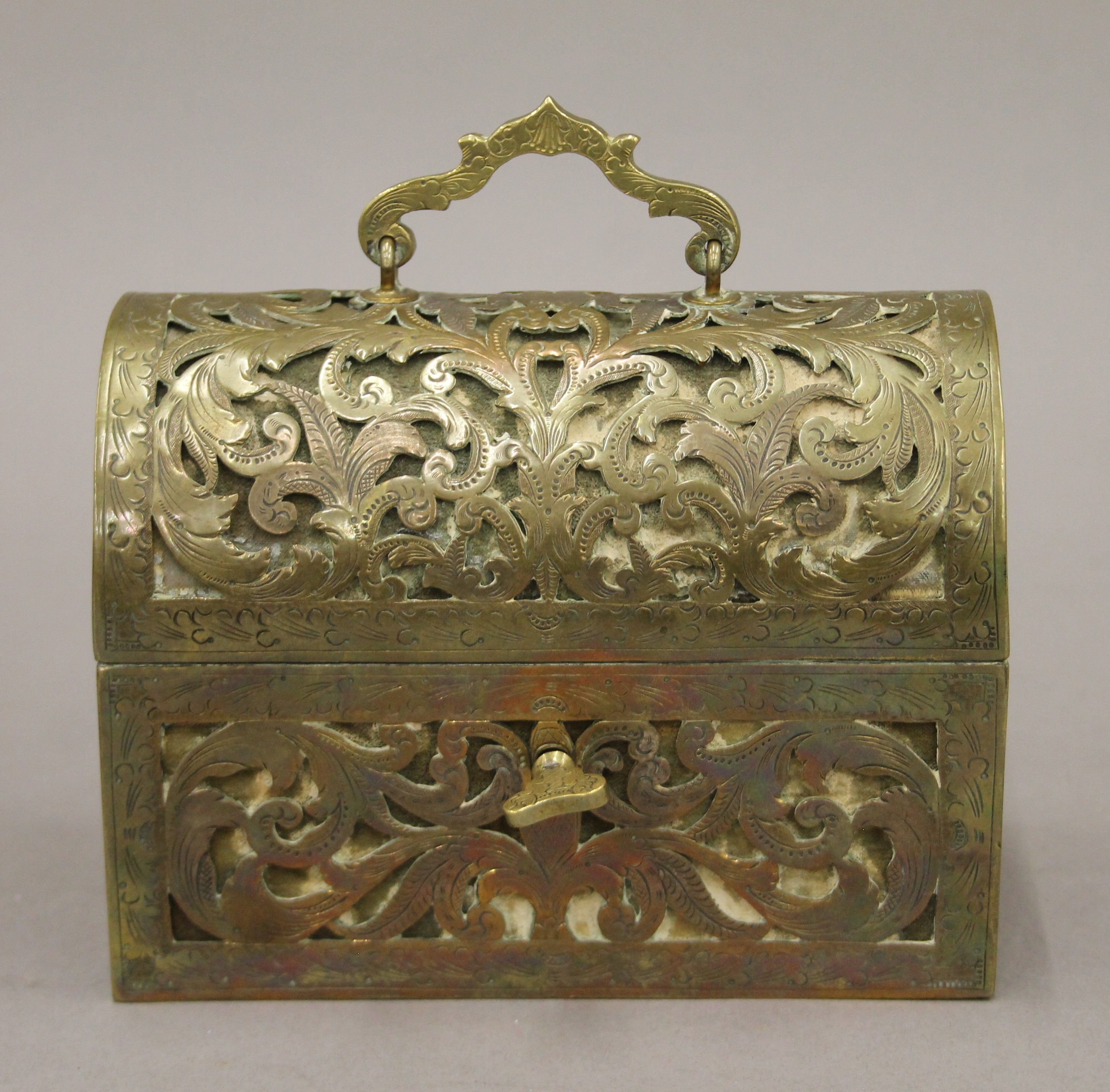 An antique dome-shaped pierced brass velvet-lined perfume casket containing three gilded cut glass - Image 2 of 6