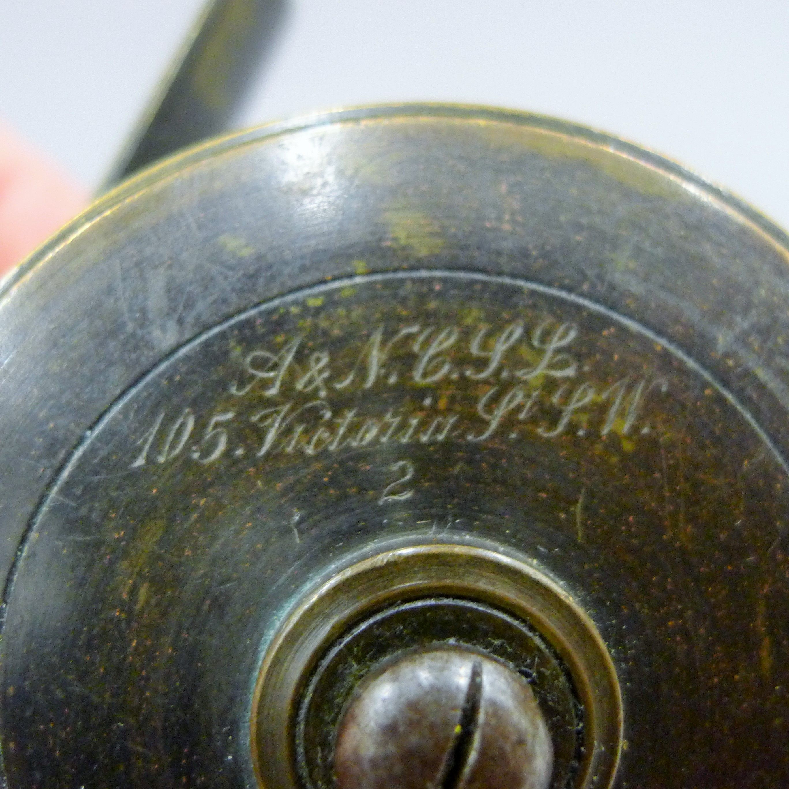 An Army and Navy 2 1/4" brass trout fly reel engraved "105 Victoria Street, SW". - Image 3 of 3