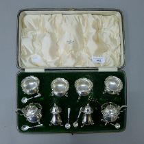 A Mappin and Webb cased silver cruet set. The case 30.5 cm long. 242 grammes.