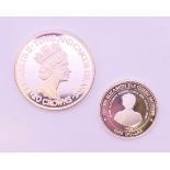 Two silver proof coins, one a Turks and Caicos 20 crowns 40th anniversary of the Accession,