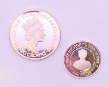 Two silver proof coins, one a Turks and Caicos 20 crowns 40th anniversary of the Accession,