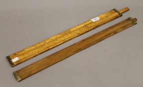 Two Victorian brass mounted boxwood slide rules, one marked Dring & Fage Makers, 56 Stamford St,