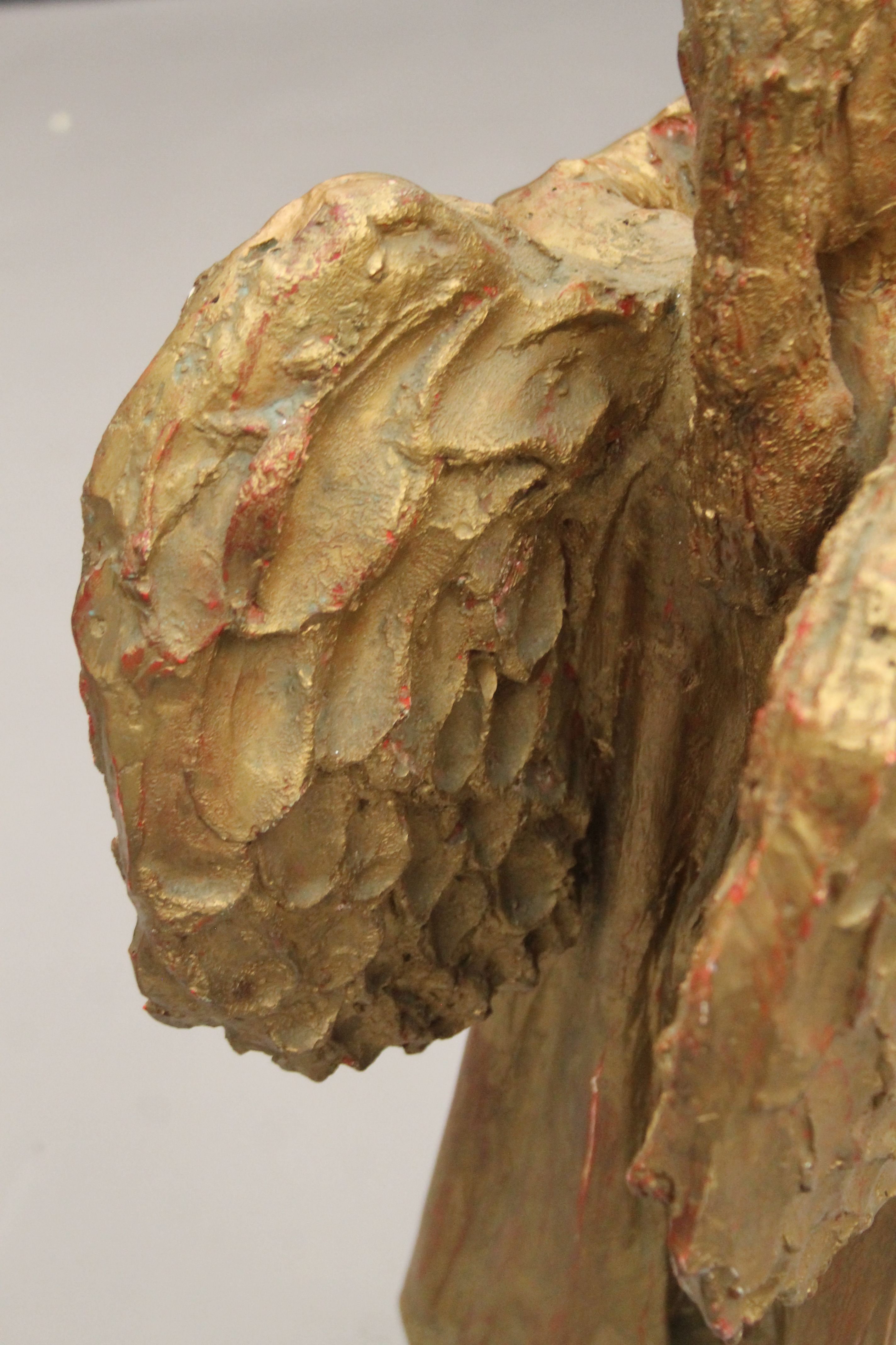 A gilt-painted sculpture of an angel mounted on a composite stone plinth base. 105 cm high. - Image 4 of 4