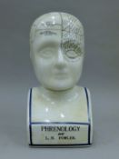 A phrenology head. 29cm high.