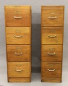 Two early 20th century oak filing cabinets. The largest 42 cm wide, each 135 cm high.