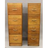 Two early 20th century oak filing cabinets. The largest 42 cm wide, each 135 cm high.