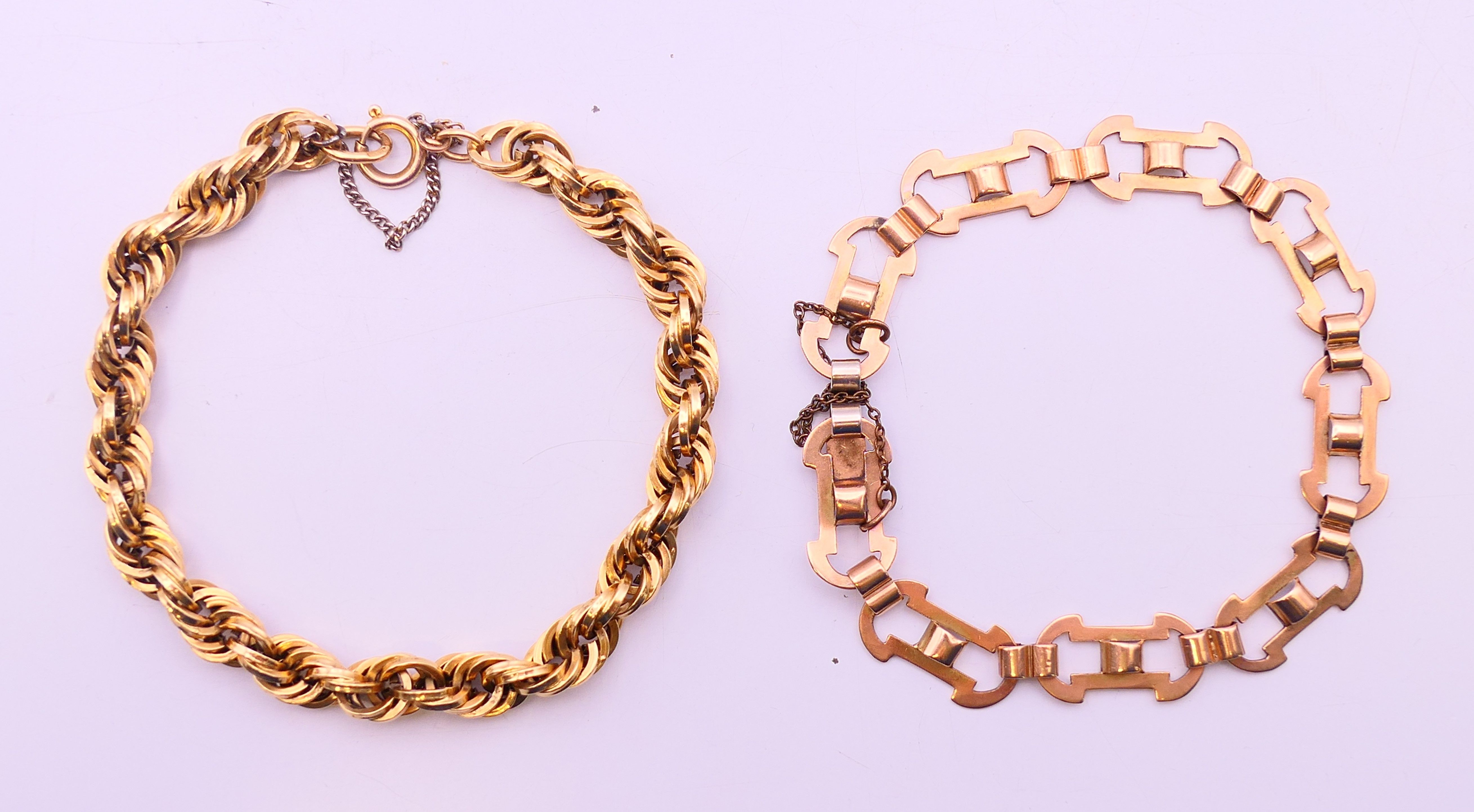 An 18 ct gold bracelet 10.1 grammes and a 9 ct gold bracelet 9 grammes.