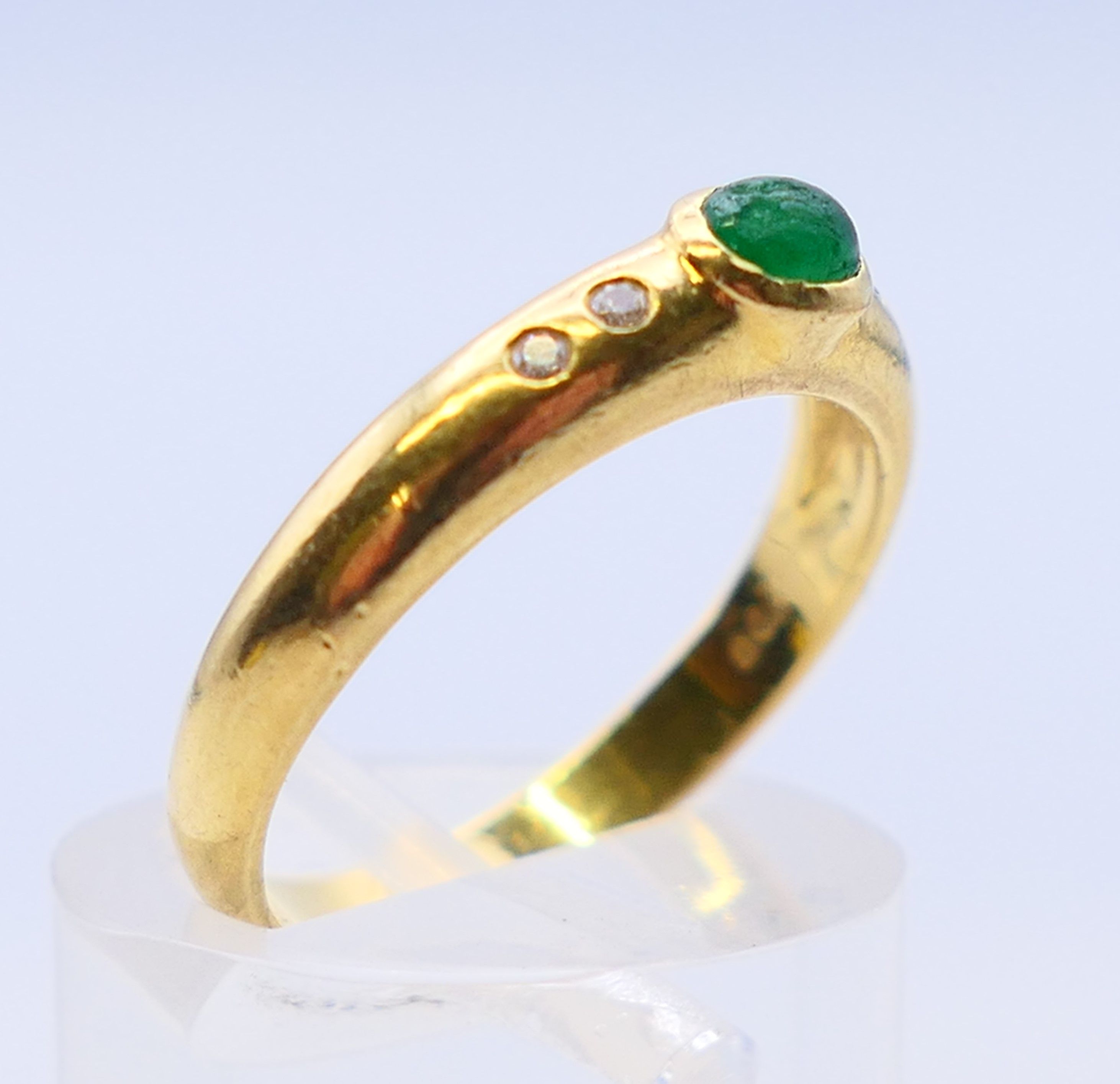 An 18 ct gold, emerald and diamond five-stone ring. Ring size M/N. - Image 3 of 7