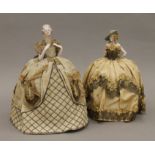 Two late 19th/early 20th century porcelain and lace half dolls. The largest 24 cm high.