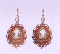 A pair of silver drop earrings. 3.5 cm high.