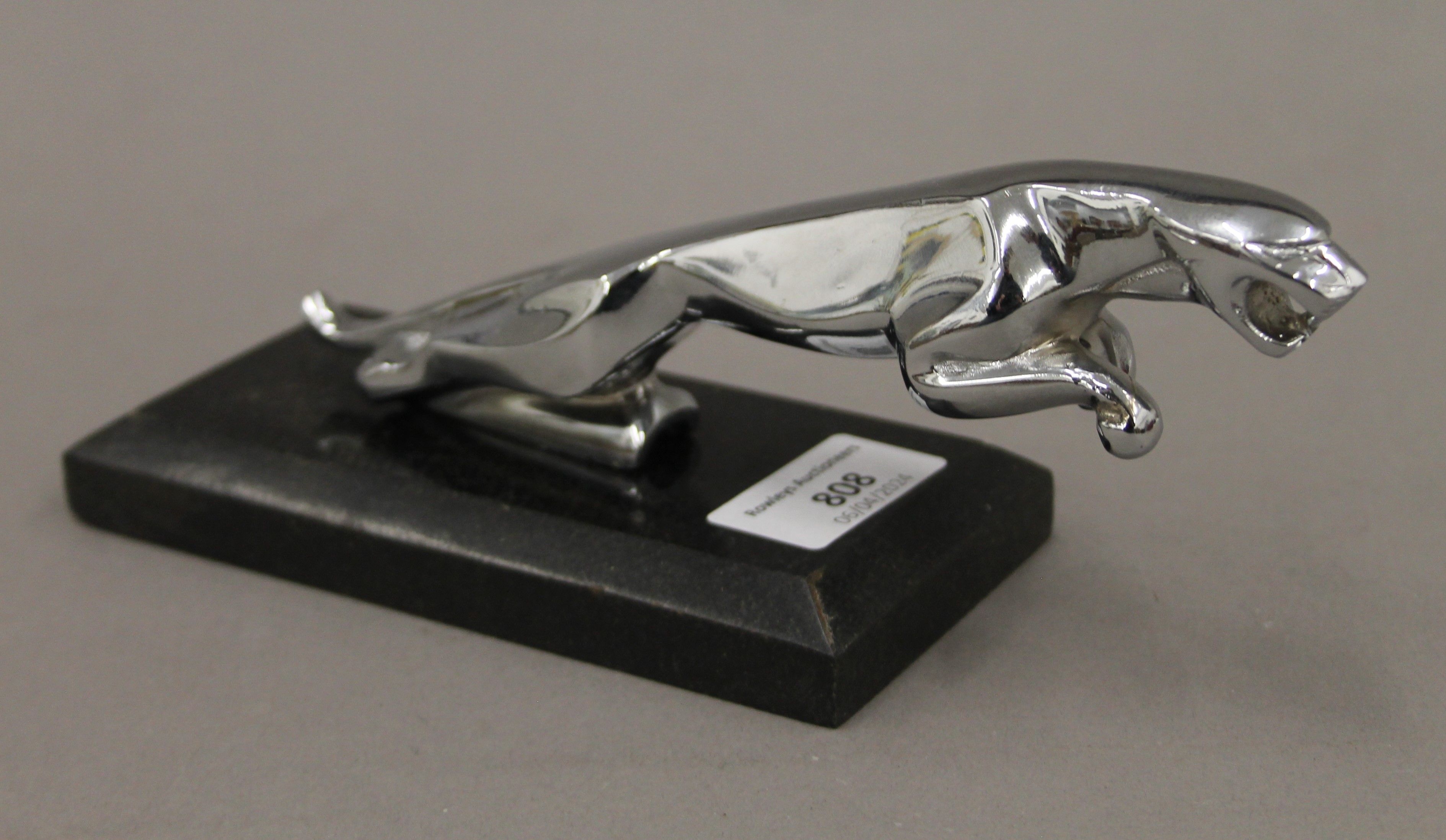 A jaguar car mascot on stand. 21 cm long overall.