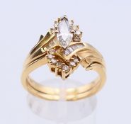 A 14 ct gold marquise diamond ring. Ring size S/T.
