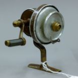 A Helical twin threadline reel in fitted rexine box. The box 11.5 cms wide.