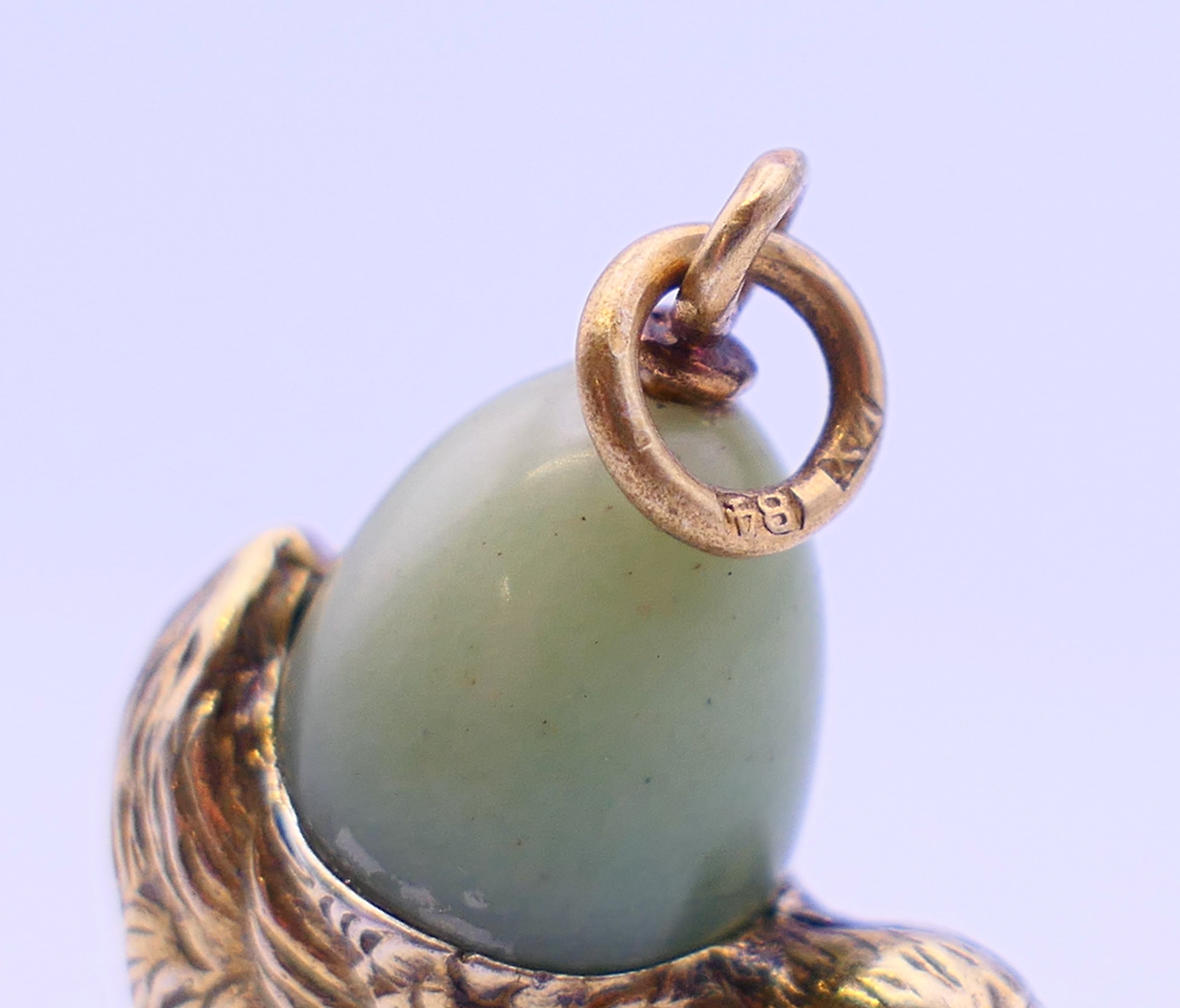 A silver and jade chick and egg pendant, bearing Russian marks. 2.5 cm high. - Image 3 of 3