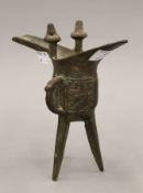 An archaistic style Chinese bronze jue. 18.5 cm high.