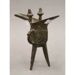 An archaistic style Chinese bronze jue. 18.5 cm high.