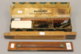 A boxed gun-cleaning outfit in a Parker-Hale box, a folding rule etc. The box 32 cm long.
