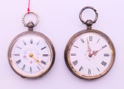 Two ladies silver fob watches with keys. 3.75 cm diameter and 4 cm diameter.