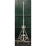 A Victorian wrought iron standard lamp. 177 cm high.