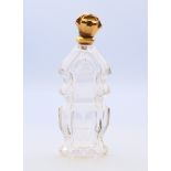 An 18 ct gold topped French scent bottle. 12 cm high.