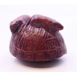 A netsuke in the form of two mice on a tortoiseshell shell. 3.5 cm high.