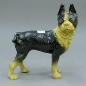 A cast iron pug dog. 20 cm high.