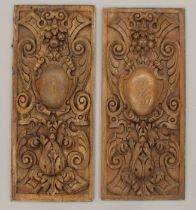 A pair of 19th century carved oak panels. Each approximately 30 x 70 cm.