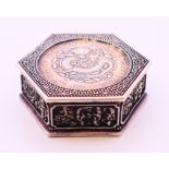 A Chinese hexagonal coin box. 6 cm wide.