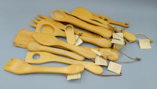 A quantity of large wooden implements. The largest 53.5 cm long.