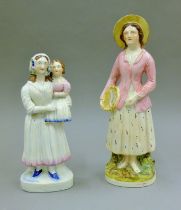 Two 19th century Staffordshire figures. The largest 28.5 cm high.