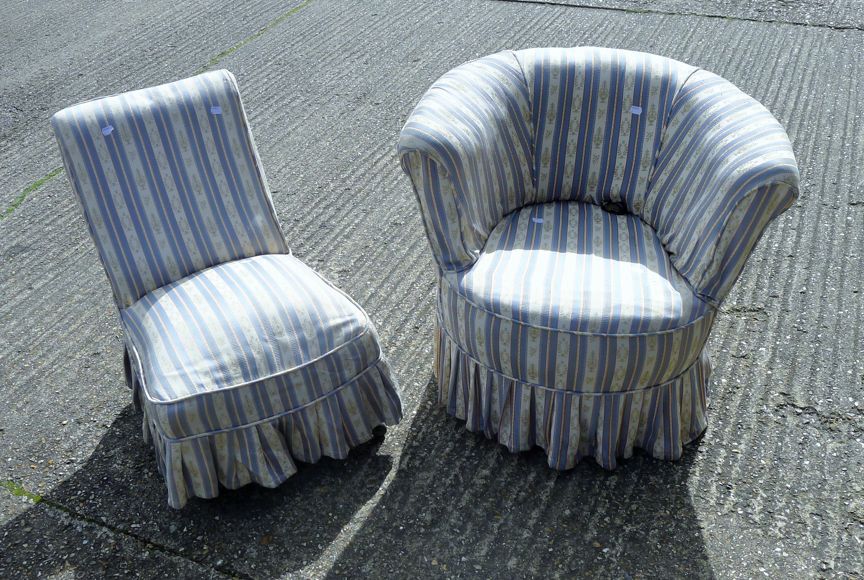 A Victorian tub chair and a Victorian nursing chair with blue and white striped loose upholstery.