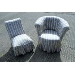 A Victorian tub chair and a Victorian nursing chair with blue and white striped loose upholstery.