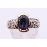 A 14 K gold, diamond and amethyst ring. Ring size M/N.