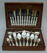 A plated cutlery canteen. 39 cm wide.