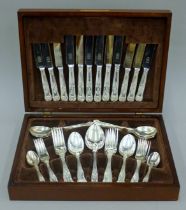 A plated cutlery canteen. 39 cm wide.