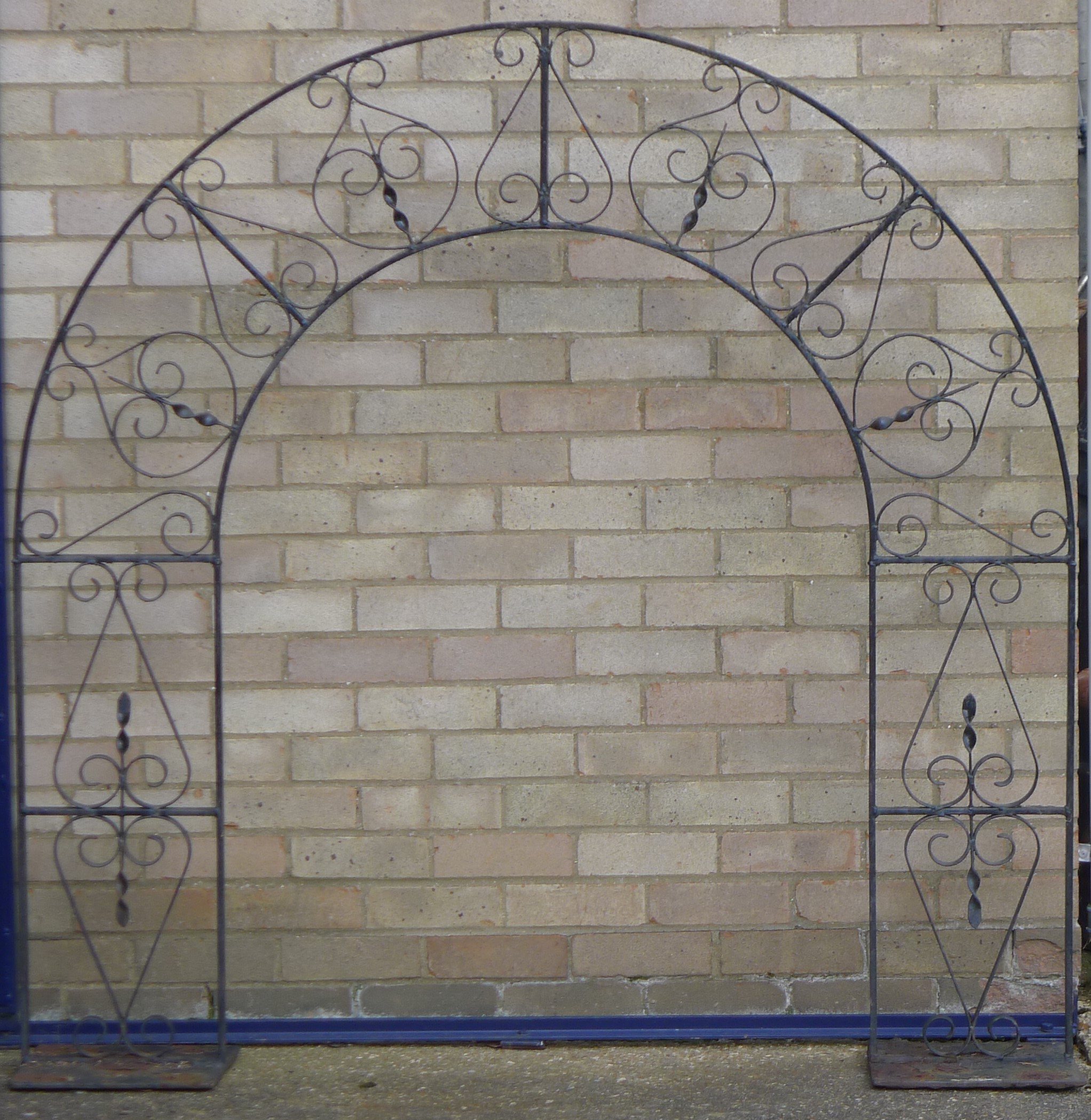 A garden arch. 153 cm wide x 156 cm high.