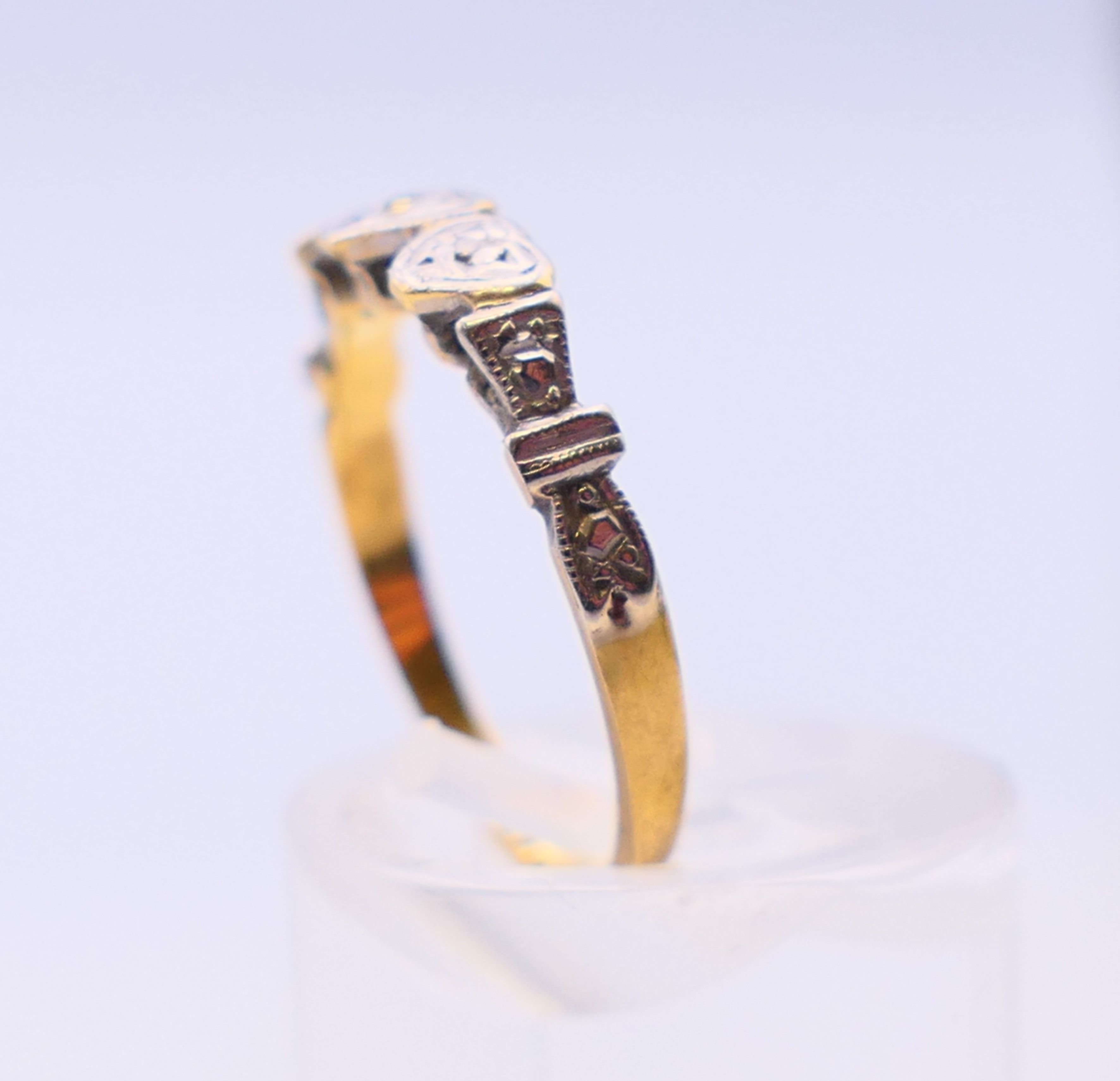 Three various gold, diamond, sapphire and emerald set rings. 4.5 grammes total weight. - Image 11 of 20