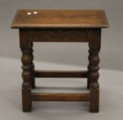 An oak joint stool. 45.5 cm long.